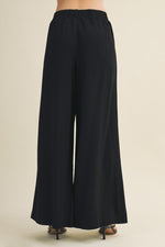 CARA PLEATED WIDE-LEG PANTS